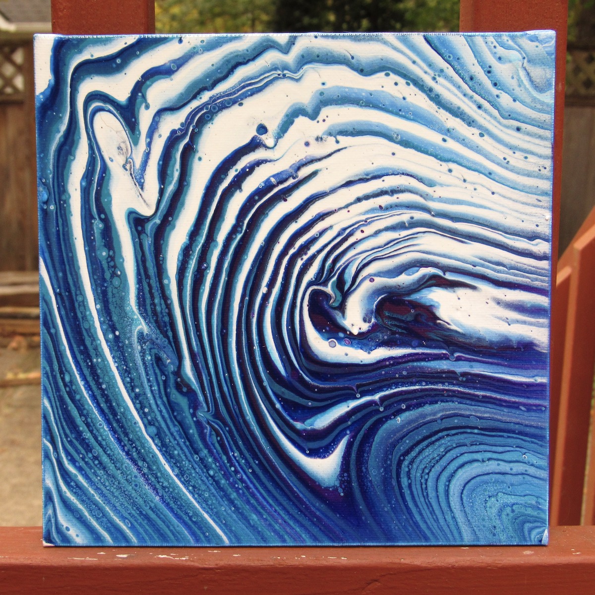 Blue acrylic pour painting